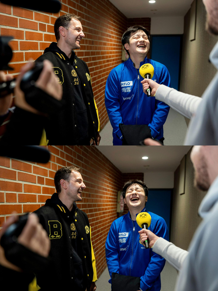 app下载-樊振东穿蓝球衣进多特蒙德更衣室创纪录|可爱_新浪体育_新浪新闻